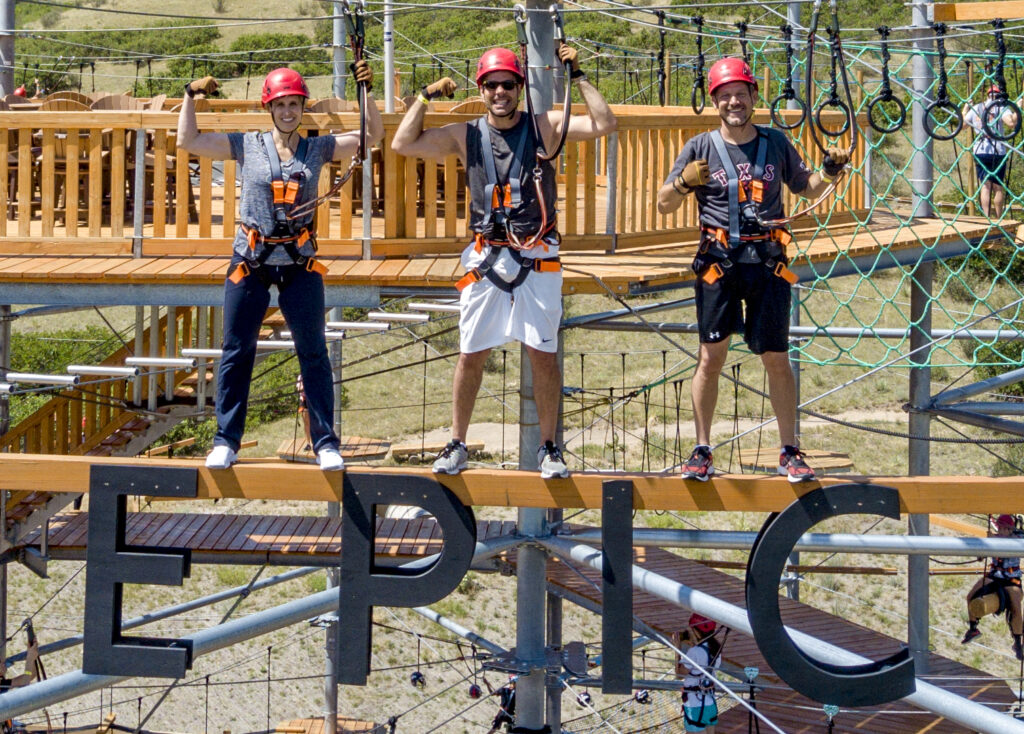 The Science Behind Adventure-Based Team Building: Why Getting Out of Your Comfort Zone Actually Works 2 team bonding epic sky trek beam e1764905929729